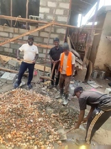 Photographs of men working on site expansion